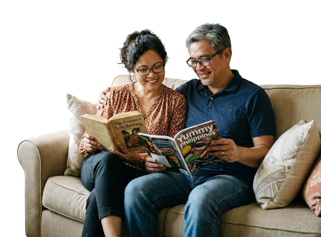 An older couple reading magazines together on a couch